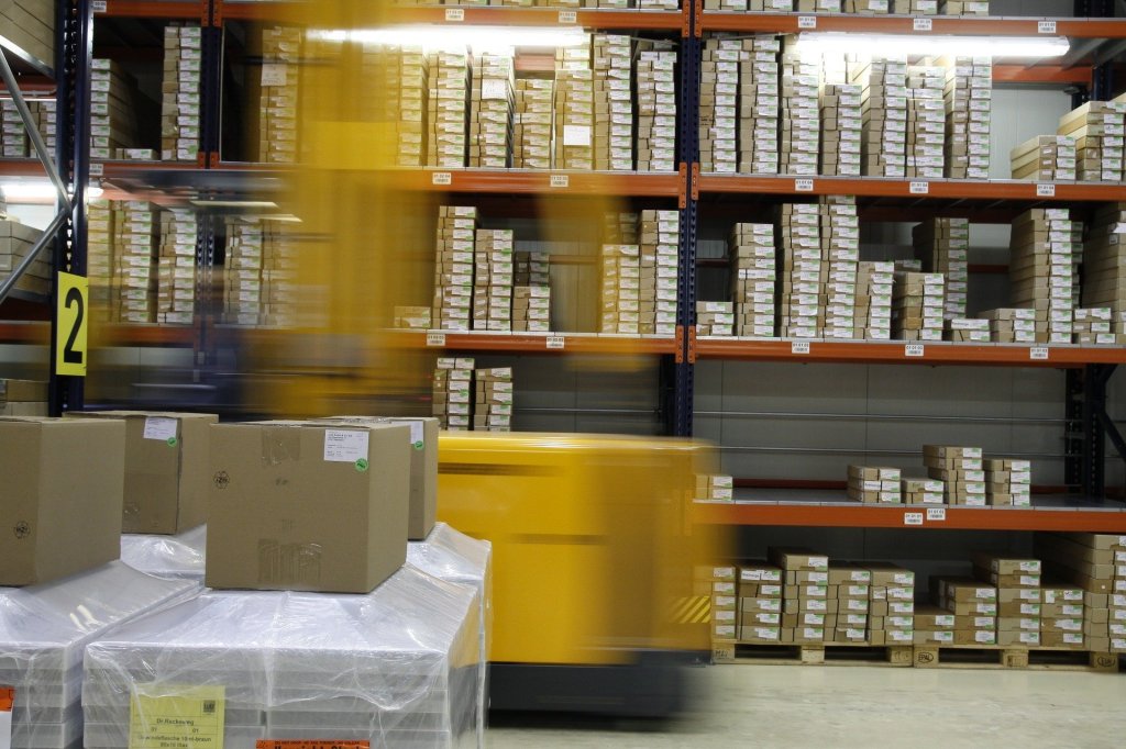 Inside a warehouse with shelves