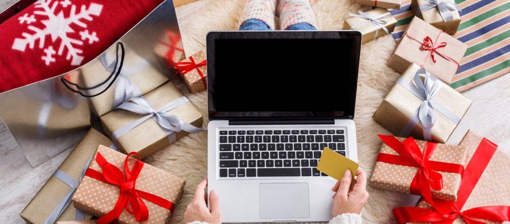 woman shopping online for the holidays