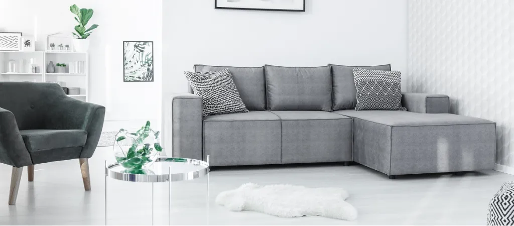 Open space flat interior in Nordic style with fresh plants
