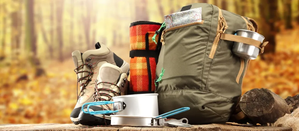 Outdoor Gear on a Bench in a Forest