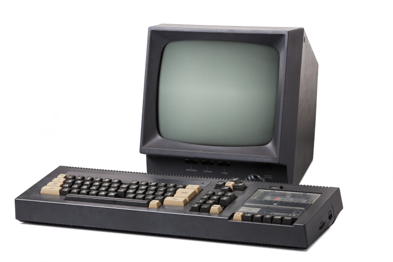 old personal computer with keyboard and screen