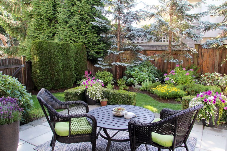 Beautifully landscaped small garden in summer. 