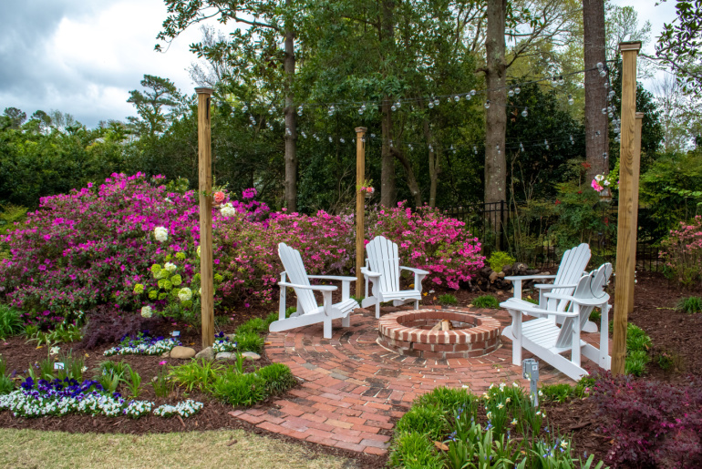 Welcome Spring and Summer with gardens designed for entertaining. Landscaped home design, small fairy gardens, painters get inspiration among the flowers.