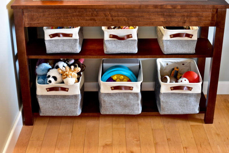 Simple easy storage baskets for living and bedroom toy clean up, neat and tidy small space living. Photo background, organization ideas, lifestyle.