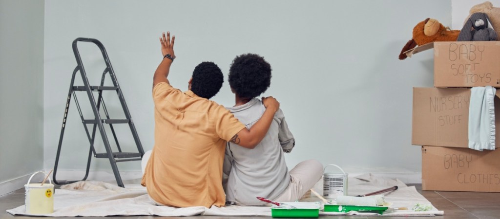 Couple doing home renovation work