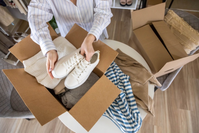 Woman organizing shoes.