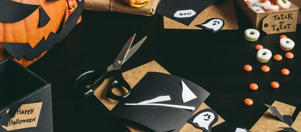 Halloween preparation. Halloween decoration made of craft paper.
