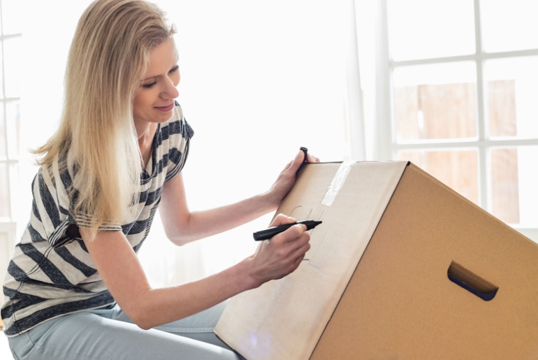 Person labeling packed items