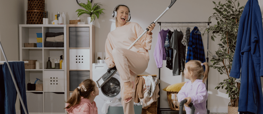Mother with children cleaning the house.