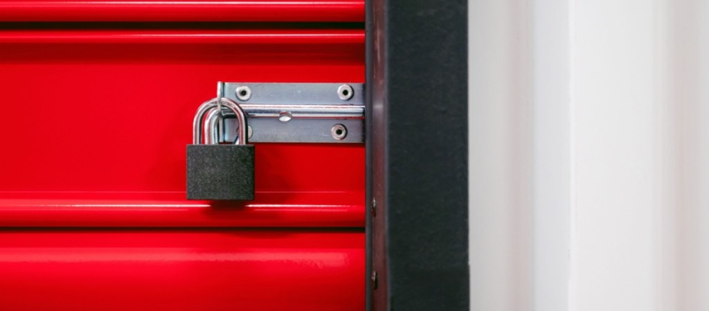 Storage unit security. Padlock on self storage door.