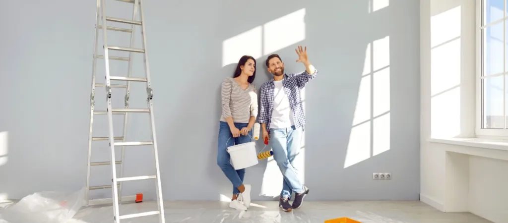 Young family couple doing renovations in their apartment
