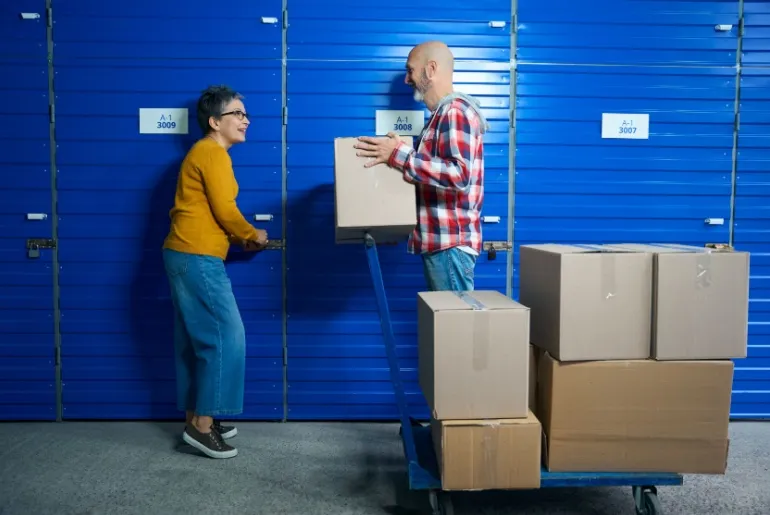 Moving-boxes-into-self-storage-after-decluttering