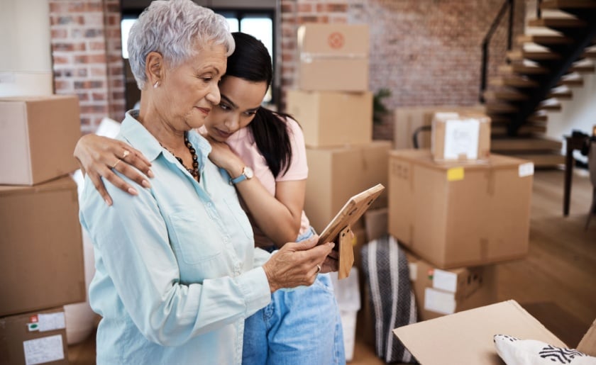 Daughter helping older mom move