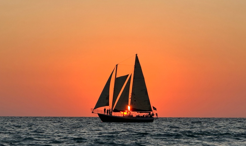 Boat on the ocean at sunset