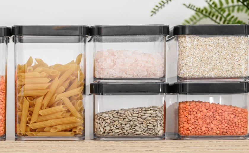 Dry goods stored in clear plastic airtight containers.