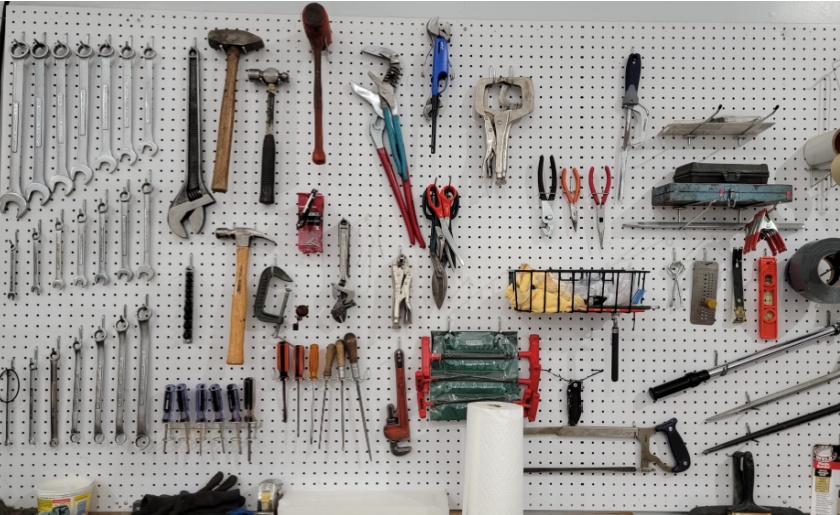 Pegboard storage wall for shop tools