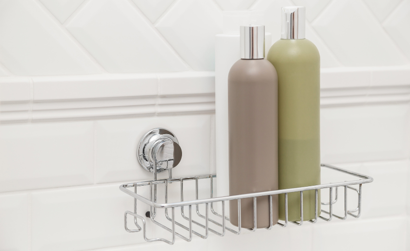 Suction cup as bath shelf, fixed on tiled wall without drilling