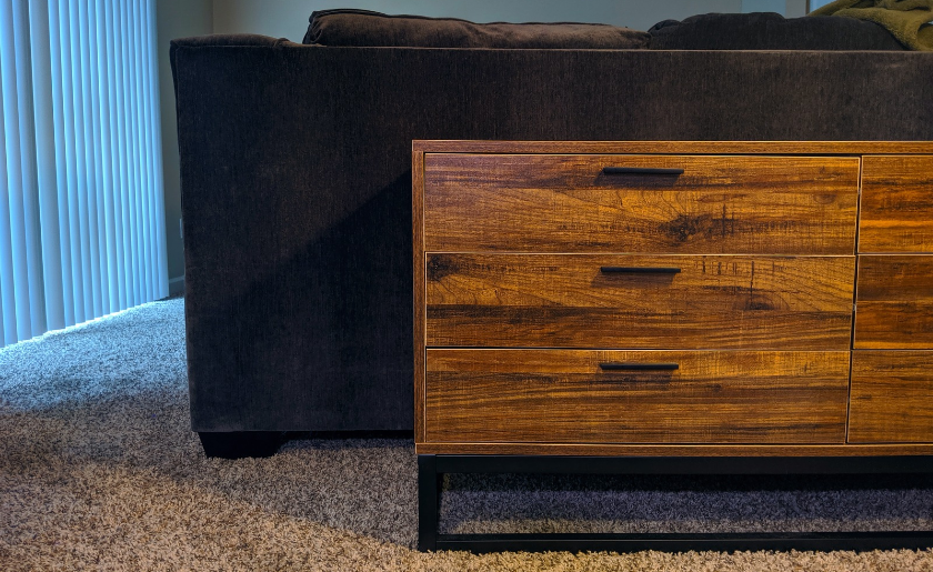 Cabinet behind a sofa
