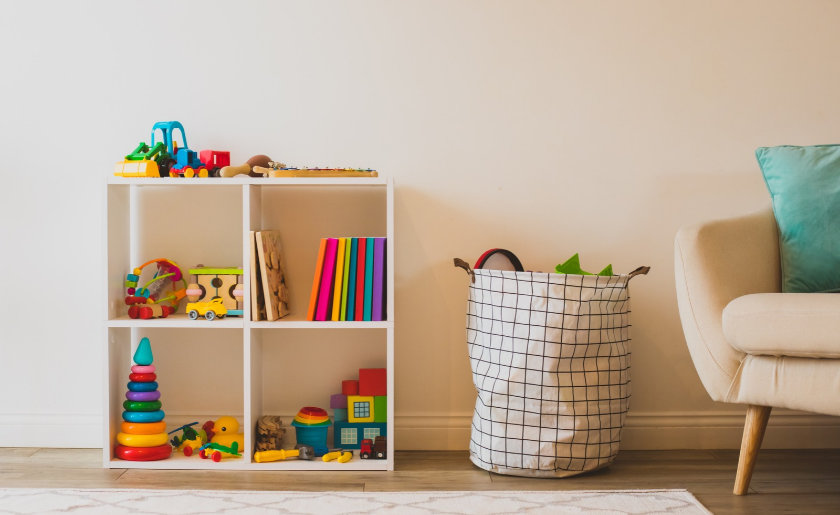 Toy storage in living room: open shelves and basket